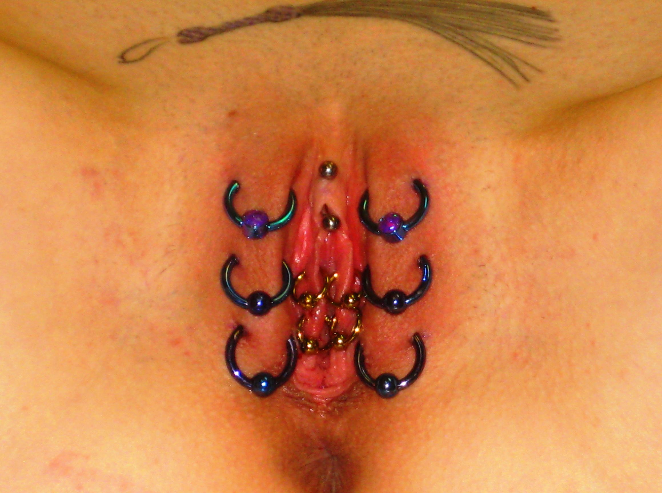 Erotic piercings and tatoos